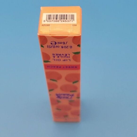 SEALED Revolution Tasty Peach Sweet Peach Lip Oil - Softly Tinted, Peach Scented - Picture 5 of 7
